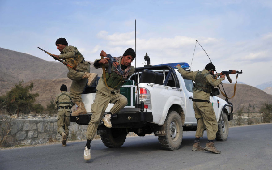 Afghan Local Police (ALP) personnel jump from their vehicle  as they patrol in Nor Gal district Kunar province.  The Afghan government welcomed President Barack Obama's announcement that the United States will withdraw 34,000 troops from the war-torn country over the next year.   NATO, which has about 37,000 troops in Afghanistan, will also withdraw them in stages before the end of 2014. (Noorullah Shirzada/Getty Images)